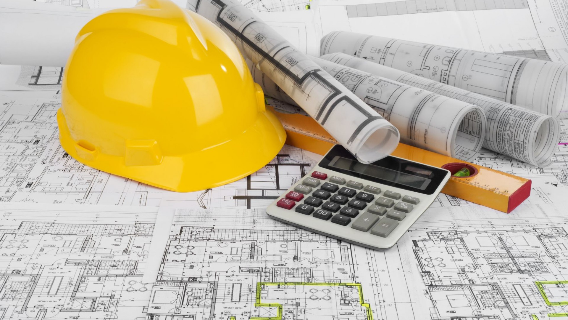 blueprints and yellow construction hat